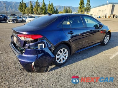 Trzecie zdjęcie samochodu z tyłu: 2026 TOYOTA COROLLA LE VIN:JTDBCMFE2T3132755 - miniatura