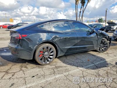 Trzecie zdjęcie samochodu z tyłu: 2021 TESLA MODEL 3 VIN:5YJ3E1EC2MF868001 - miniatura