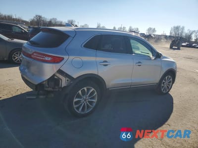 Trzecie zdjęcie samochodu z tyłu: 2017 LINCOLN MKC SELECT VIN:5LMCJ2C98HUL24889 - miniatura