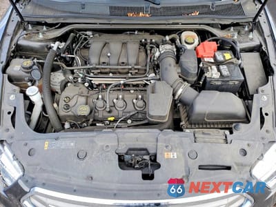 Zdjęcie 11 z 12 samochodu: 2018 FORD TAURUS SEL VIN:1FAHP2E84JG117412 - miniatura