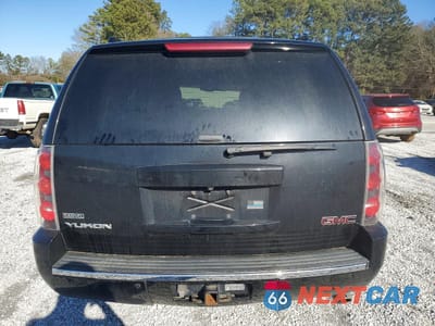 Zdjęcie 6 z 14 samochodu: 2012 GMC YUKON DENALI VIN:1GKS2EEFXCR257636 - miniatura