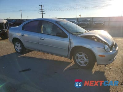 Czwarte zdjęcie samochodu z boku: 2002 DODGE NEON VIN:1B3ES26C92D559945 - miniatura