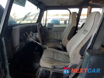 Zdjęcie 7 z 12 samochodu: 1993 JEEP WRANGLER VIN:1J4FY29SXPP269556 - miniatura