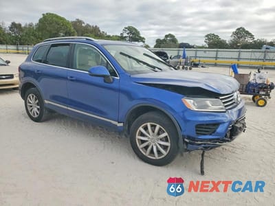 Czwarte zdjęcie samochodu z boku: 2016 VOLKSWAGEN TOUAREG SPORT VIN:WVGEF9BP4GD010144 - miniatura