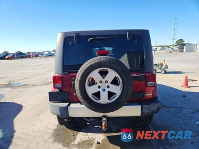 Zdjęcie 6 z 12 samochodu: 2012 JEEP WRANGLER UNLIMITED SAHARA VIN:1C4BJWEGXCL173008 - miniatura