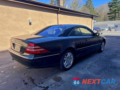 Czwarte zdjęcie samochodu z boku: 2002 MERCEDES-BENZ CL 500 VIN:WDBPJ75J12A028536 - miniatura