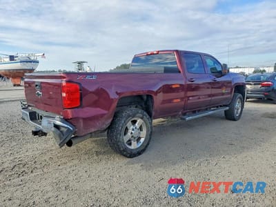 Trzecie zdjęcie samochodu z tyłu: 2016 CHEVROLET SILVERADO K2500 HEAVY DUTY LT VIN:1GC1KVE83GF264816 - miniatura