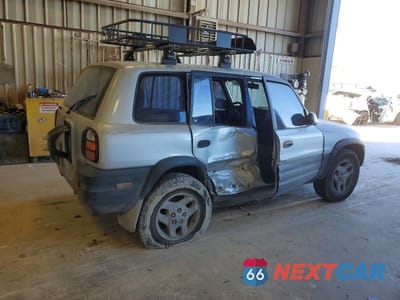 Trzecie zdjęcie samochodu z tyłu: 1998 TOYOTA RAV4 VIN:JT3GP10VXW7034544 - miniatura