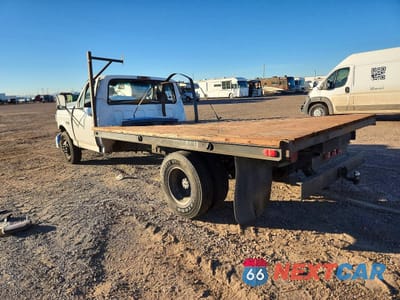 Trzecie zdjęcie samochodu z tyłu: 1997 FORD F350 SUPER DUTY FLATBED TRUCK VIN:3FEKF37F1VMA64451 - miniatura