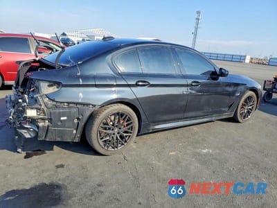 Trzecie zdjęcie samochodu z tyłu: 2023 BMW 530E VIN:WBA13AG01PCM05474 - miniatura