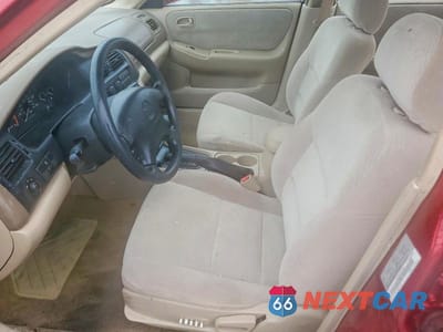 Zdjęcie 7 z 11 samochodu: 1999 MAZDA 626 ES VIN:1YVGF22C3X5818622 - miniatura