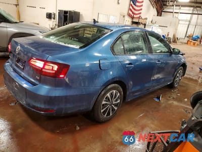 Trzecie zdjęcie samochodu z tyłu: 2016 VOLKSWAGEN JETTA S VIN:3VW267AJ1GM274304 - miniatura