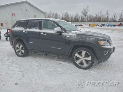 Czwarte zdjęcie samochodu z boku: 2014 JEEP GRAND CHEROKEE LIMITED VIN:1C4RJFBG9EC108057 - miniatura