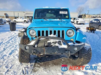 Piąte zdjęcie samochodu w środku: 2017 JEEP WRANGLER UNLIMITED SAHARA VIN:1C4HJWEG8HL646910 - miniatura