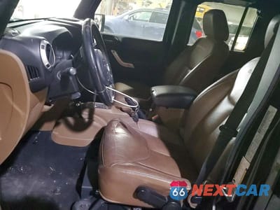 Zdjęcie 7 z 12 samochodu: 2015 JEEP WRANGLER UNLIMITED SAHARA VIN:1C4HJWEG6FL528447 - miniatura