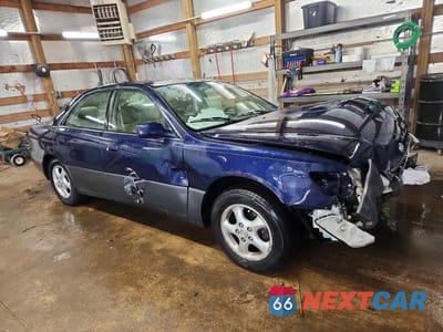 Czwarte zdjęcie samochodu z boku: 1997 LEXUS ES 300 VIN:JT8BF22G6V0001771 - miniatura