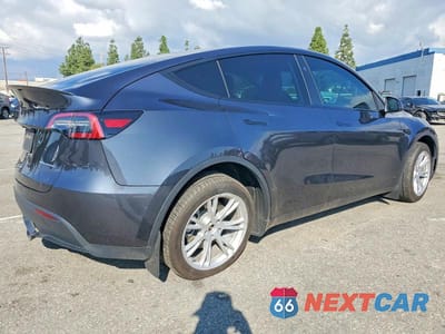 Trzecie zdjęcie samochodu z tyłu: 2024 TESLA MODEL Y VIN:7SAYGDEE5RA264419 - miniatura