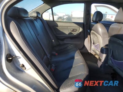 Zdjęcie 10 z 12 samochodu: 2003 HYUNDAI ELANTRA GLS VIN:KMHDN45D73U683085 - miniatura