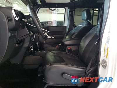 Zdjęcie 7 z 12 samochodu: 2015 JEEP WRANGLER UNLIMITED SAHARA VIN:1C4BJWEG1FL643527 - miniatura