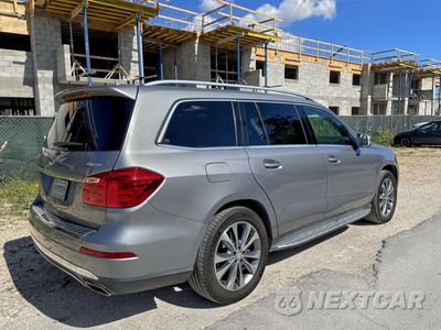 Czwarte zdjęcie samochodu z boku: 2015 MERCEDES-BENZ GL 450 4MATIC VIN:4JGDF6EE4FA495227 - miniatura