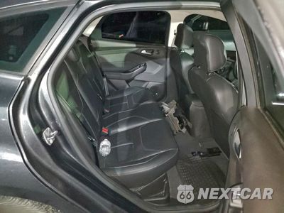 Zdjęcie 11 z 14 samochodu: 2016 FORD FOCUS TITANIUM VIN:1FADP3N2XGL374784 - miniatura