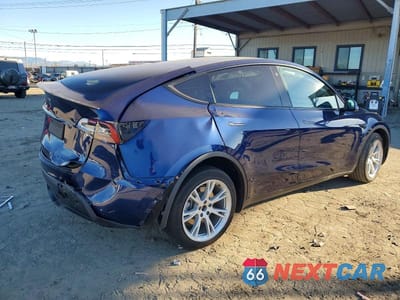 Trzecie zdjęcie samochodu z tyłu: 2022 TESLA MODEL Y VIN:7SAYGDEEXNF429524 - miniatura
