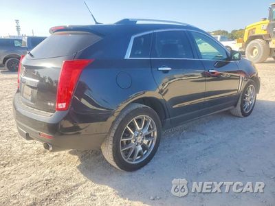 Trzecie zdjęcie samochodu z tyłu: 2013 CADILLAC SRX PREMIUM COLLECTION VIN:3GYFNJE32DS608731 - miniatura