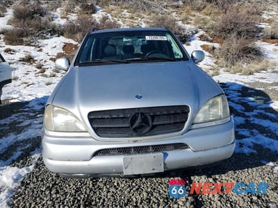 Piąte zdjęcie samochodu w środku: 2000 MERCEDES-BENZ ML 320 VIN:4JGAB54E6YA210542 - miniatura