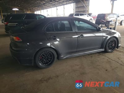 Trzecie zdjęcie samochodu z tyłu: 2015 MITSUBISHI LANCER EVOLUTION GSR VIN:JA32W8FV1FU007788 - miniatura