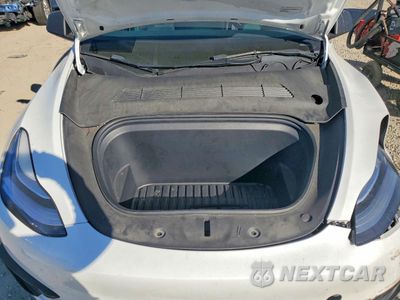Zdjęcie 12 z 14 samochodu: 2023 TESLA MODEL Y VIN:7SAYGDEE1PA151600 - miniatura