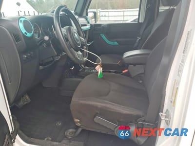 Zdjęcie 7 z 13 samochodu: 2014 JEEP WRANGLER UNLIMITED SPORT VIN:1C4BJWDG7EL208463 - miniatura