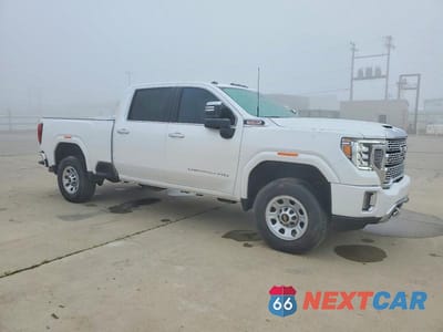 Czwarte zdjęcie samochodu z boku: 2022 GMC SIERRA K2500 DENALI VIN:1GT49REY9NF324711 - miniatura