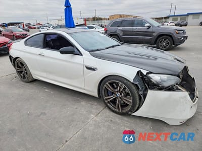 Czwarte zdjęcie samochodu z boku: 2013 BMW M6 VIN:WBSLX9C51DC968660 - miniatura