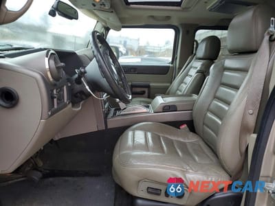 Zdjęcie 7 z 13 samochodu: 2004 HUMMER H2 VIN:5GRGN23U04H102723 - miniatura