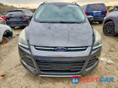 Piąte zdjęcie samochodu w środku: 2016 FORD ESCAPE TITANIUM VIN:1FMCU9J99GUA01892 - miniatura