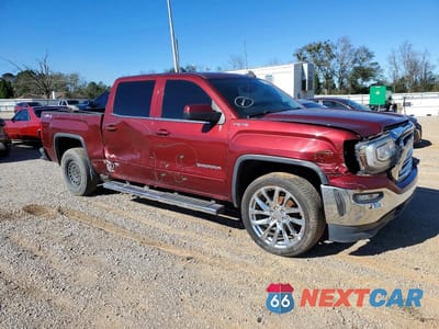 Czwarte zdjęcie samochodu z boku: 2017 GMC SIERRA K1500 SLE VIN:3GTU2MEC0HG135931 - miniatura