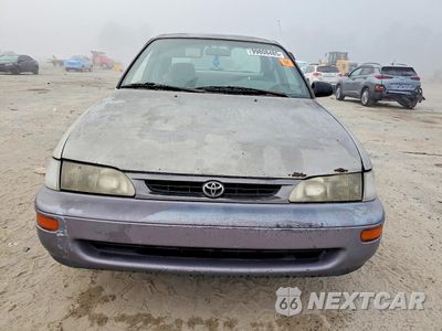 Piąte zdjęcie samochodu w środku: 1997 TOYOTA COROLLA BASE VIN:1NXBA02EXVZ664798 - miniatura