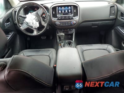 Zdjęcie 8 z 13 samochodu: 2021 GMC CANYON AT4 VIN:1GTG6FEN5M1116377 - miniatura