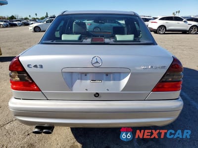 Zdjęcie 6 z 13 samochodu: 1998 MERCEDES-BENZ C 43 VIN:WDBHA33GXWF705001 - miniatura