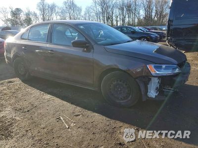 Czwarte zdjęcie samochodu z boku: 2014 VOLKSWAGEN JETTA BASE VIN:3VW2K7AJ1EM356624 - miniatura