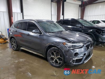 Czwarte zdjęcie samochodu z boku: 2019 BMW X1 XDRIVE28I VIN:WBXHT3C59K5L90477 - miniatura