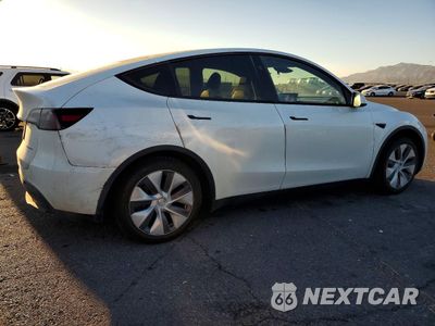 Trzecie zdjęcie samochodu z tyłu: 2023 TESLA MODEL Y VIN:7SAYGDEE1PF890629 - miniatura