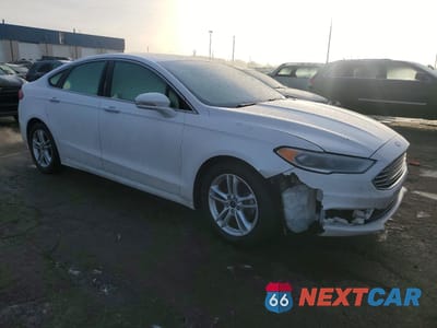 Czwarte zdjęcie samochodu z boku: 2018 FORD FUSION SE VIN:3FA6P0HD9JR176078 - miniatura