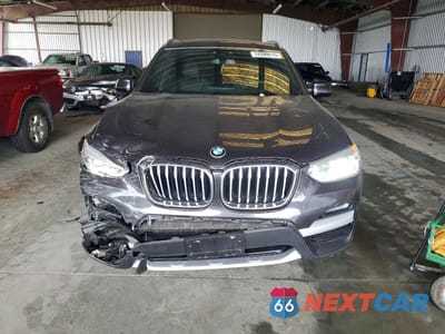 Piąte zdjęcie samochodu w środku: 2021 BMW X3 XDRIVE30E VIN:5UXTS1C0XM9D79116 - miniatura