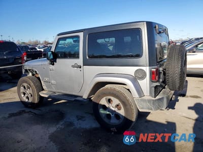 Drugie zdjęcie samochodu z przodu: 2016 JEEP WRANGLER SAHARA VIN:1C4AJWBG0GL307823 - miniatura