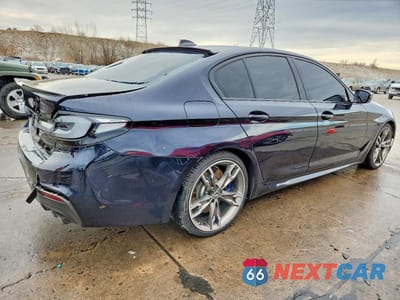 Trzecie zdjęcie samochodu z tyłu: 2020 BMW M550XI VIN:WBAJS7C04LBN96562 - miniatura