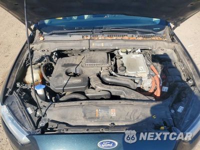 Zdjęcie 11 z 12 samochodu: 2014 FORD FUSION TITANIUM HEV VIN:3FA6P0RU3ER285494 - miniatura