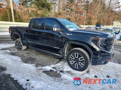Czwarte zdjęcie samochodu z boku: 2022 GMC SIERRA K1500 AT4 VIN:3GTUUEET3NG604554 - miniatura