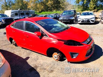 Czwarte zdjęcie samochodu z boku: 2013 FORD FIESTA SE VIN:3FADP4BJ5DM186279 - miniatura