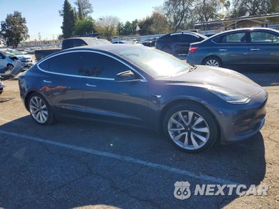 Czwarte zdjęcie samochodu z boku: 2019 TESLA MODEL 3 VIN:5YJ3E1EA6KF314410 - miniatura
